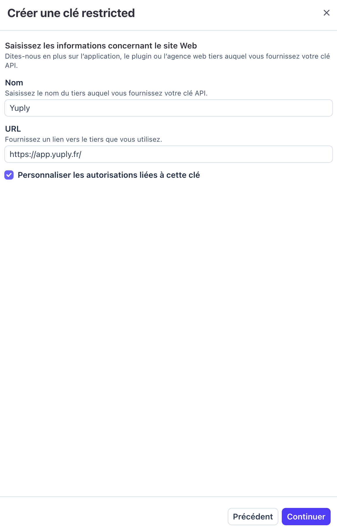Formulaire Stripe de création d'une clé restreinte avec le nom Yuply et l'URL app.yuply.fr